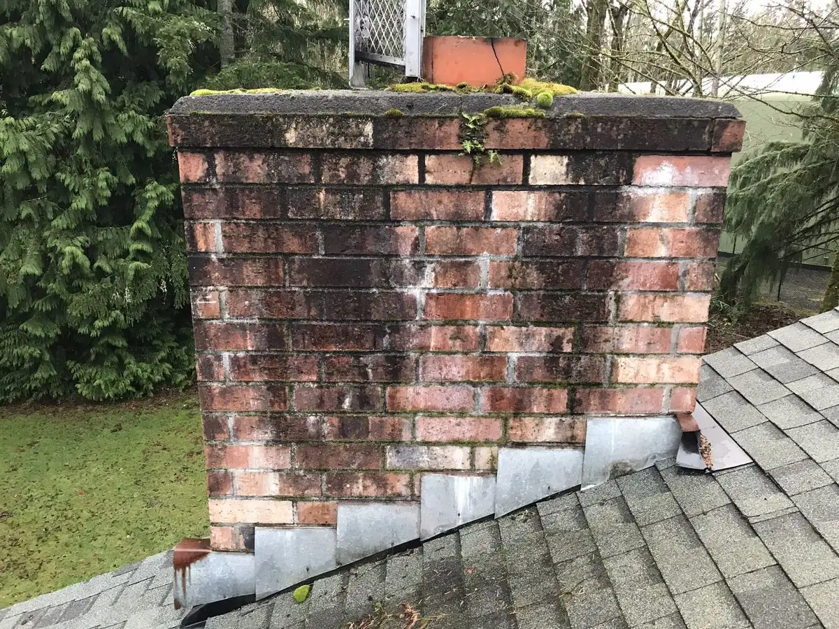 Before: Crumbling chimney crown with damage
