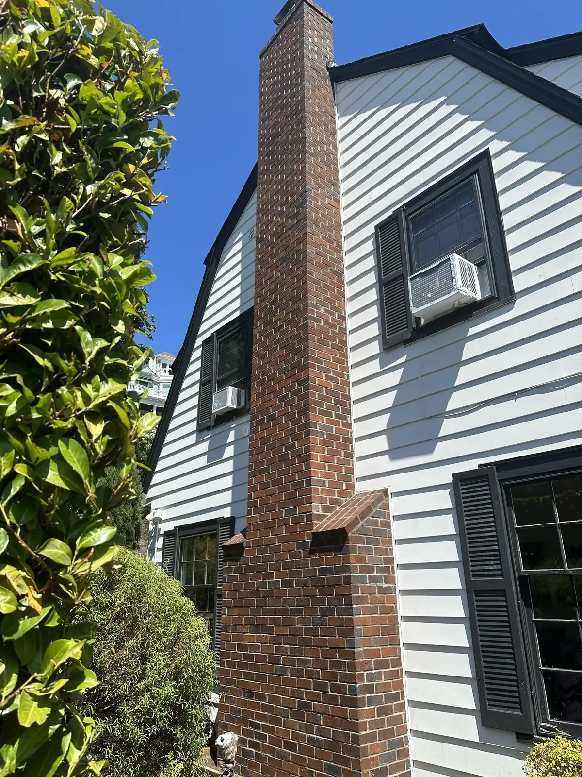 Full height exterior chimney in excellent condition