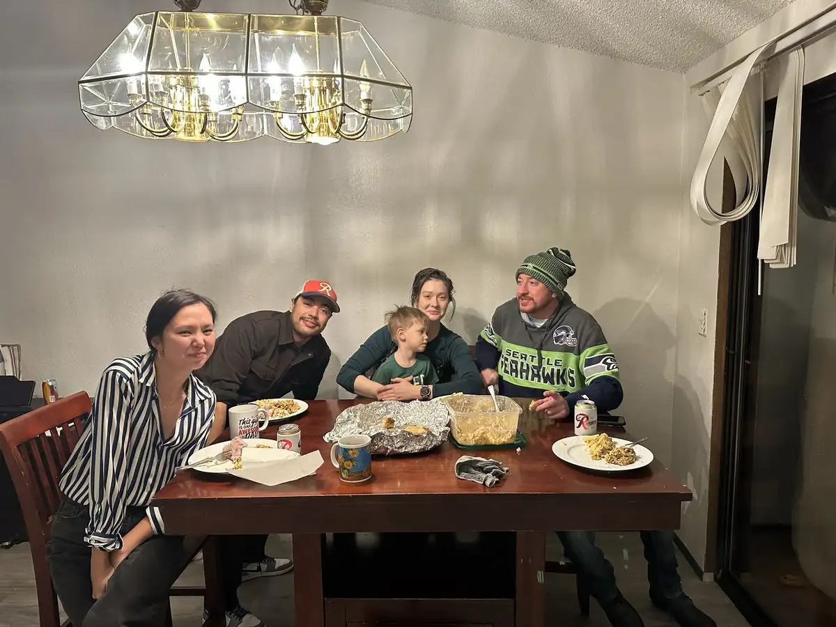 The Mad Hatter Chimney Sweep team photo in front of actual shop with company truck and signage